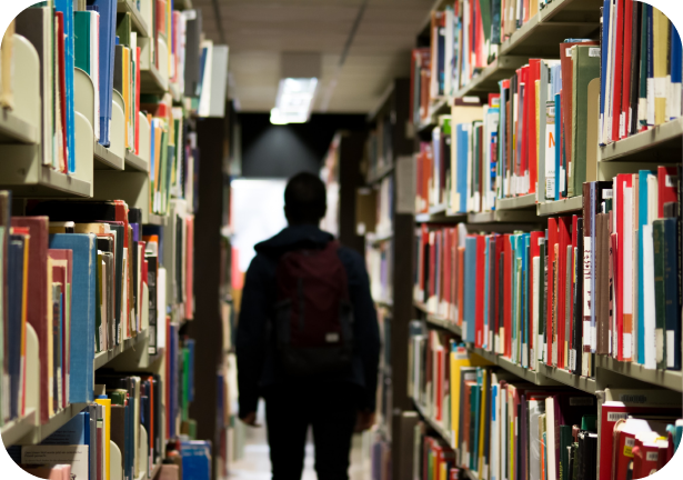 an image of man in the middle of library