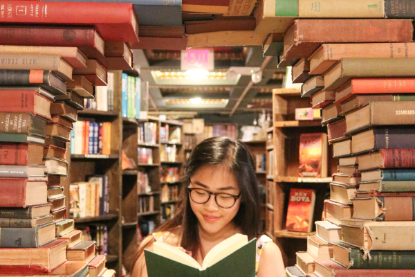 an image of apple on a set of books